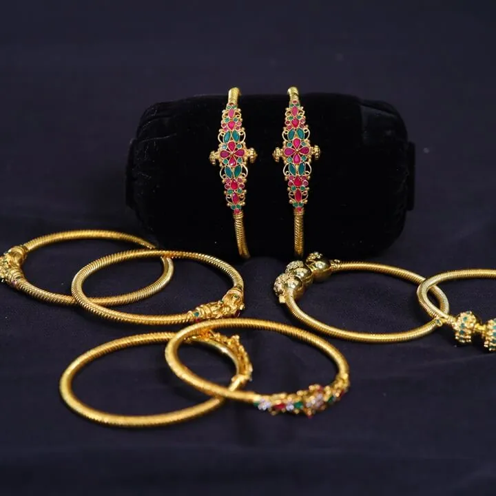  Light Weight Gold Plated primerose Spring Bangles